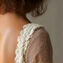 Intricate lace and silk detail from a bespoke gala gown